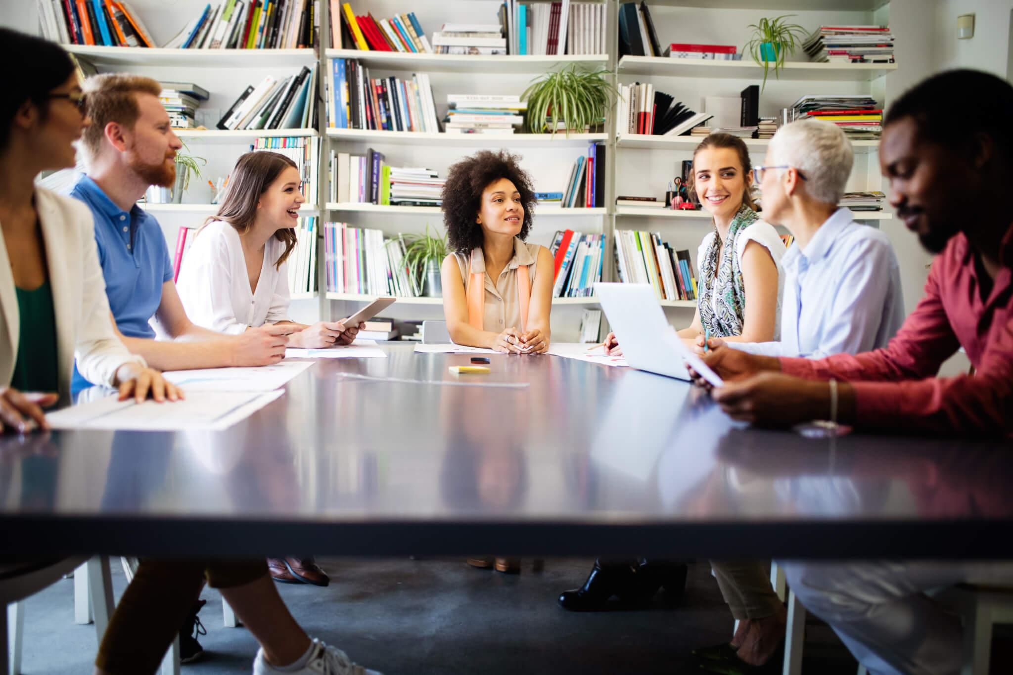 Group of successful business people at work in office