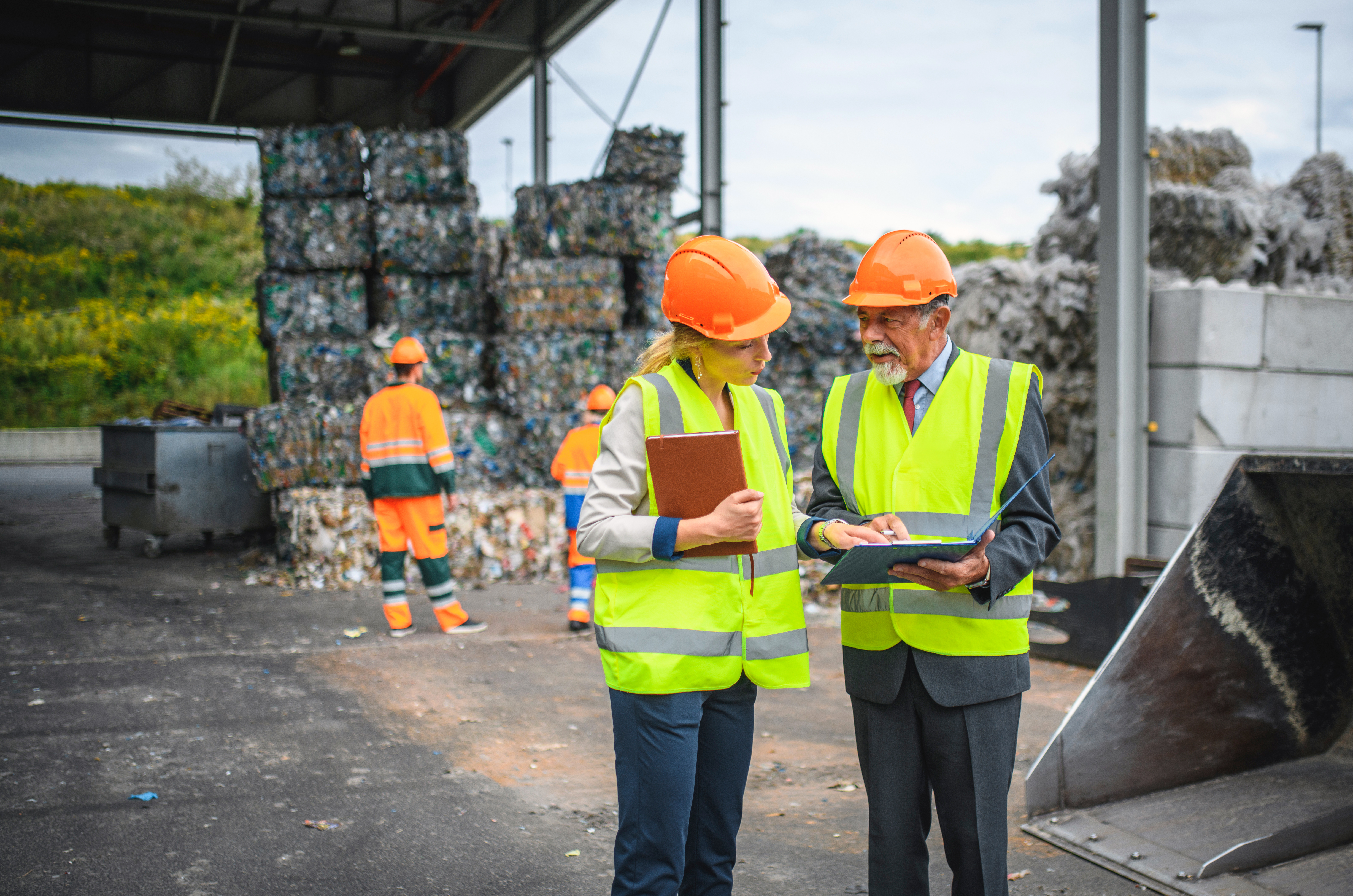 Quality Control Inspectors at Waste Management Facility