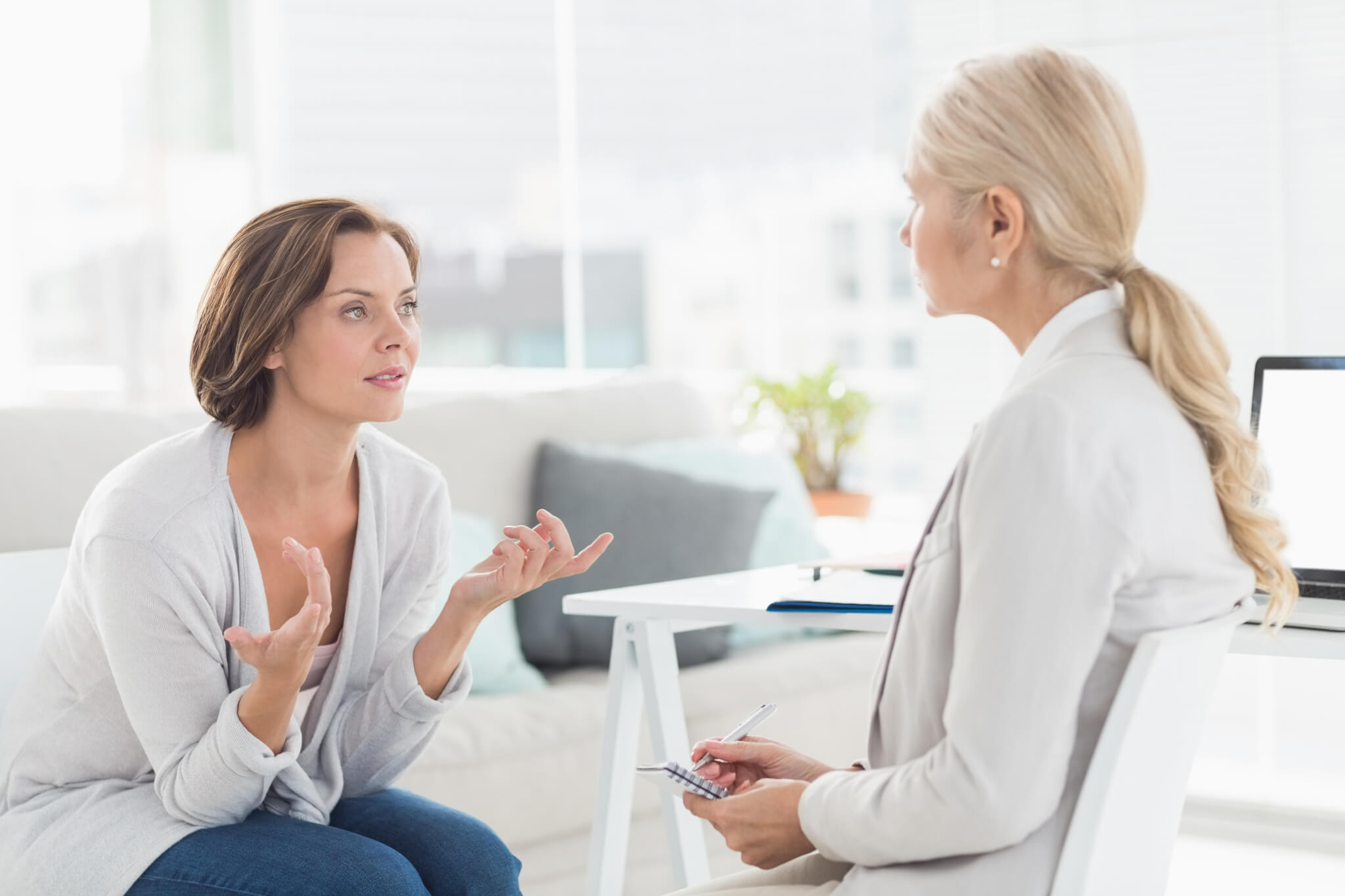 Woman talking with therapist